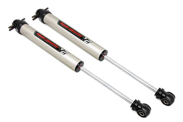 Unmatched Ride Quality On and Off the Road: Whether you're crawling over rocky terrain or cruising down city streets, Rough Country's V2 Monotube Shock Absorber delivers the control, comfort, and performance you demand. Engineered for enthusiasts who expect more from their suspension, the V2 offers a smooth, consistent ride in all conditions.Precision Monotube Design: Each shock features a premium monotube body with an Internal Floating Piston (IFP) that keeps high-pressure nitrogen and shock oil completely separate. The result? Rapid response with zero cavitation, just crisp, fade-free damping at every bump, dip, and obstacle.High-Performance Construction: Equipped with a massive 46mm high-flow piston, the V2 ensures superior fluid control and long-term durability. The nitrogen-charged design minimizes aeration for improved handling and stability during aggressive use.Striking Style Meets Superior Strength: Crafted from lightweight T6061 brushed aluminum and finished with black anodized accents, the V2 not only resists corrosion and dissipates heat faster, it also turns heads with its rugged, modern look.Engineered for Longevity: With 36kN tensile strength and an inverted mounting design to protect vital components, the V2 is built to withstand harsh environments and hard-hitting trails without compromise.\
Peace of Mind Included: Each V2 Monotube Shock Absorber is backed by a 3-year manufacturer's warranty, ensuring long-term confidence in every ride.
