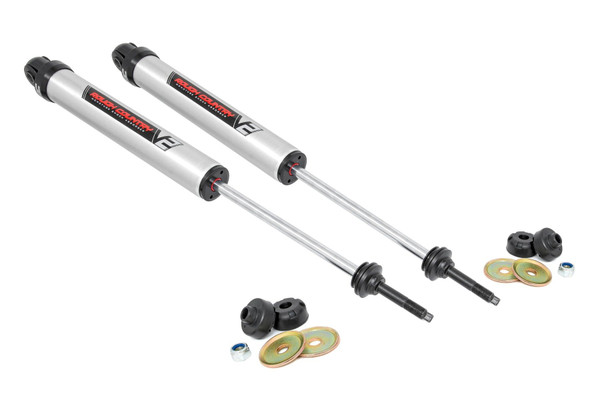 Unmatched Ride Quality On and Off the Road: Whether you're crawling over rocky terrain or cruising down city streets, Rough Country's V2 Monotube Shock Absorber delivers the control, comfort, and performance you demand. Engineered for enthusiasts who expect more from their suspension, the V2 offers a smooth, consistent ride in all conditions.Precision Monotube Design: Each shock features a premium monotube body with an Internal Floating Piston (IFP) that keeps high-pressure nitrogen and shock oil completely separate. The result? Rapid response with zero cavitation, just crisp, fade-free damping at every bump, dip, and obstacle.High-Performance Construction: Equipped with a massive 46mm high-flow piston, the V2 ensures superior fluid control and long-term durability. The nitrogen-charged design minimizes aeration for improved handling and stability during aggressive use.Striking Style Meets Superior Strength: Crafted from lightweight T6061 brushed aluminum and finished with black anodized accents, the V2 not only resists corrosion and dissipates heat faster, it also turns heads with its rugged, modern look.Engineered for Longevity: With 36kN tensile strength and an inverted mounting design to protect vital components, the V2 is built to withstand harsh environments and hard-hitting trails without compromise.\
Peace of Mind Included: Each V2 Monotube Shock Absorber is backed by a 3-year manufacturer's warranty, ensuring long-term confidence in every ride.