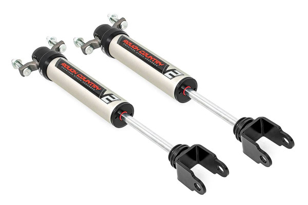 Unmatched Ride Quality On and Off the Road: Whether you're crawling over rocky terrain or cruising down city streets, Rough Country's V2 Monotube Shock Absorber delivers the control, comfort, and performance you demand. Engineered for enthusiasts who expect more from their suspension, the V2 offers a smooth, consistent ride in all conditions.Precision Monotube Design: Each shock features a premium monotube body with an Internal Floating Piston (IFP) that keeps high-pressure nitrogen and shock oil completely separate. The result? Rapid response with zero cavitation, just crisp, fade-free damping at every bump, dip, and obstacle.High-Performance Construction: Equipped with a massive 46mm high-flow piston, the V2 ensures superior fluid control and long-term durability. The nitrogen-charged design minimizes aeration for improved handling and stability during aggressive use.Striking Style Meets Superior Strength: Crafted from lightweight T6061 brushed aluminum and finished with black anodized accents, the V2 not only resists corrosion and dissipates heat faster, it also turns heads with its rugged, modern look.Engineered for Longevity: With 36kN tensile strength and an inverted mounting design to protect vital components, the V2 is built to withstand harsh environments and hard-hitting trails without compromise.\
Peace of Mind Included: Each V2 Monotube Shock Absorber is backed by a 3-year manufacturer's warranty, ensuring long-term confidence in every ride.