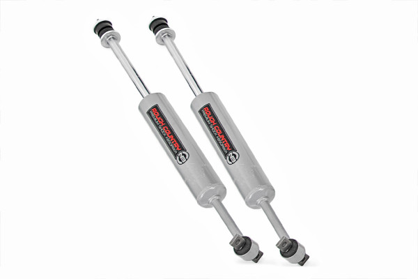 Experience superior ride quality on and off the road with Rough Country's premium N3 shocks!Enhanced Performance: Engineered with 10-stage variable valving, these shocks provide precise damping control for a smooth highway ride and confident off-road handling.Reliable Durability: The high-pressure nitrogen charge ensures consistent performance, while the durable 18mm chromed hardened piston rod resists corrosion and enhances longevity.Superior Cooling Efficiency: A robust 54mm shock body dissipates heat faster, preventing shock fade during intense use.Built to Last: With an impressive 36kN tensile strength, these shocks are designed to endure heavy impacts and challenging terrain.All-Weather Reliability: Military-spec fluid rated to -40 degrees celsius ensures dependable performance in extreme conditions.Smooth and Quiet Ride: Natural rubber bushings absorb vibrations and minimize road noise for improved comfort.Sleek and Durable Finish: Finished in an eye-catching metallic silver paint for added corrosion resistance and a stylish touch.Backed by Rough Country's 3-year Manufacturer's Warranty for peace of mind.