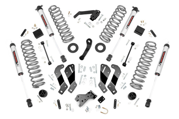 Experience the ultimate ride and handling with Rough Country's 3.5-Inch Control Arm Drop Kit for Jeep JK. This all-inclusive upgrade delivers smooth handling, enhanced ride quality, and aggressive off-road capability for a complete suspension transformation that performs on and off the road.Superior Lift & Clearance: Front and rear lifted coil springs provide the clearance needed to run up to 35x12.50 tires while maintaining a balanced, commanding stance. These factory-tuned springs are calibrated to preserve stock ride comfort even with added lift.Custom Shock Options: Tailor your suspension to your driving style with nitrogen-charged N3 shocks, V2, M1 Monotube, or premium M1R shocks. From plush daily driving to maximum off-road control, this kit lets you dial in your preferred ride.Optimized Suspension Geometry: Engineered control arm drop brackets reposition your factory control arms to restore ideal suspension geometry. This results in smoother handling, improved alignment, and enhanced stability across any terrain.Improved Coil Efficiency: Rear coil correction plates adjust the coil spring angle by 10 degrees, optimizing suspension performance and increasing coil longevity under flex and articulation.Confidence You Can Count On: Backed by Rough Country's Limited Lifetime Replacement Warranty, this lift kit provides the durability and peace of mind you need for years of adventure.