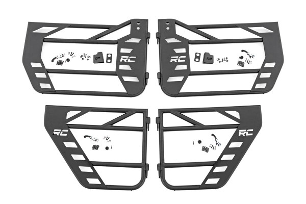 Put the wind in your hair and freedom at your fingertips with Rough CountryΓÇÖs Steel Tube Doors! These durable, steel doors give your vehicle an aggressive look while giving you increased visibility without sacrificing safety.ThereΓÇÖs little in this world that can match the feeling of riding in a Jeep with nothing between you and the world around you! Rough CountryΓÇÖs easy-to-install tubular steel doors allow you to keep your occupants safe while enjoying the open air. These durable, 1.25in diameter tube steel doors with integrated latching system keep everyone contained and comfortable for the duration of the journey. Rough CountryΓÇÖs Tube Doors feature a high-quality, black powder coat thatΓÇÖs designed to resist corrosion for a long lifespan of good looks. The simple bolt-on installation process makes them easy to install, allowing for a total transformation of your Jeep in no-time flat! Each front tube door Includes a mounting point to attach the factory mirrors. \
\