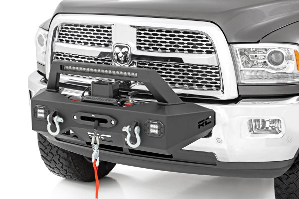 Add a professional recovery and lighting solution to your vehicle with Rough CountryΓÇÖs EXO Winch Mount System for Ram 2500 Trucks. This innovative recovery solution bolts-on right over the factory bumper, giving your truck a wealth of new abilities and aggressive good looks.Rough CountryΓÇÖs EXO Winch Mount System features a 20in Black Series Single-Row LED Light bar and two Flush Mount Black-Series LED Cubes for incredible off-road illumination. A rugged 1/4in thick steel winch mount can fit any standard-sized winch while a set of reinforced d-rings offer the perfect recovery point to get you out of any jam.Best of all, this kit is easy to install, with a 100% bolt-on installation process thatΓÇÖs simple enough to do in any home garage and can be fully returned to stock at any time. Upgrade your truck with Rough CountryΓÇÖs EXO Winch Mount System and gain incredible recovery and lighting power in an instant!  \\
\\