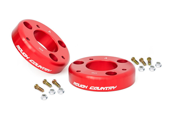 Level your F-150 in style with Rough Country's sleek and durable Aluminum Leveling Spacer. This innovative design combines eye-catching aesthetics with unbeatable strength, offering 2 inches of lift for improved off-road performance. Crafted from premium T6061 Billet Aluminum, this spacer ensures top-tier durability, resisting rust and corrosion even in harsh weather conditions.Effortless Bolt-On Installation: The easy-to-install, 100% bolt-on design makes upgrading your ride a hassle-free experience. No cutting or drilling required - install in just a few hours!Preserves Factory Ride Quality: Keep the smooth, factory ride you love, while gaining added height and performance.Boosts Ground Clearance: Perfect for off-road enthusiasts, the spacer provides increased clearance for tackling tougher terrain and adding larger tires.Perfectly Levels Front and Rear: Achieve a balanced, aggressive stance by leveling the front with the rear of your truck.No Strut Disassembly Required: Save time and effort with a straightforward installation process that doesn't require disassembling your struts.With a design featuring a driver and passenger side pattern, the spacer ensures proper clearance between the upper control arm and the strut. Best of all, this kit lets you run up to 33-inch tires, giving your truck an intimidating presence on or off the road.