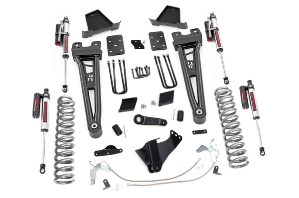 Compliment your 11-14 Ford F-250's aggressive, good looks with Rough Country's 6-inch Radius Arm Lift Kit. Rough Country's 6-inch Lift Kit was engineered to retain the F-250's impressive factory specs while bumping up performance and durability where it's needed most. The result is an aggressive, lifted beast with a mean profile and balanced on and off-road ride quality.When changing a vehicle's suspension, the key to preserving ride quality is in keeping the geometry of all suspension components as close to their factory angles as possible. Rough Country's new 6-inch Radius Arm Suspension Lift features a set of ultra-durable Radius Arms, precision fit to bolt right into the factory mounts for an easier install and a more factory-like angle. At 27lbs each, these beefy, upgraded Radius Arms dwarf stock equipment while and feature durable durable rubber bushings for maximum vibration absorption.This all-inclusive kit also features an adjustable alignment cam at the axle to allow caster adjustment as well as a track bar relocation bracket and a drop pitman arm. A full set of N2.0 Shocks provide a truly balanced ride quality for on and off-road use - perfect for daily drivers. This kit also ships with a set of durable, lifted coil springs and brake line relocation brackets.This innovative kit design features a 100% bolt-on installation process that is lightning fast compared to other kits this size. Save time and money with no need for cutting, drilling, or other complicated procedures. Rough Country's 6-inch Radius Arm Lift Kit is backed by our Lifetime Replacement Warranty.