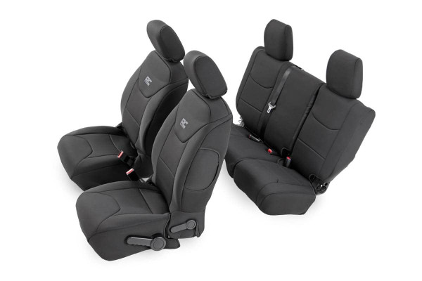 Want to protect your seats or are your seats showing signs of wear and tear from daily use? Say goodbye to unsightly stains and deterioration with Rough Country's Neoprene Seat Covers - the ultimate solution for preserving your vehicle's interior.Snug Fit for Optimal Protection: Our seat covers are tailored to fit your seats perfectly, providing a protective barrier against spills, scratches, and everyday wear and tear.Factory-Spec Construction: Engineered to meet factory specifications, our covers blend seamlessly with your vehicle's interior, giving it a fresh, new look without compromising on quality or style.Four-Layer Defense: With a four-layer construction featuring foam padding and a durable polyester shell, our seat covers offer unmatched protection and longevity, ensuring your seats stay looking new for years to come.Breathable and Water-Resistant: The neoprene layer not only provides breathability for added comfort but also boasts water-resistant properties, safeguarding your seats from spills and stains.Complete Coverage: Our covers come with full protection for your front seats, including headrest covers where applicable, as well as rear covers to shield your back seats from children and pet-related mishaps.Peace of Mind Warranty: Rest easy knowing your purchase is backed by our two-year warranty, giving you confidence in the durability and reliability of our product.Don't let worn-out seats diminish your driving experience. Upgrade to Neoprene Seat Covers today and enjoy a fresh, stylish interior that's protected against the rigors of daily life on the road.