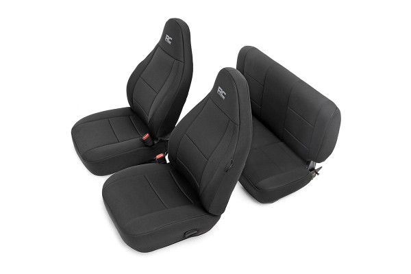 Want to protect your seats or are your seats showing signs of wear and tear from daily use? Say goodbye to unsightly stains and deterioration with Rough Country's Neoprene Seat Covers - the ultimate solution for preserving your vehicle's interior.Snug Fit for Optimal Protection: Our seat covers are tailored to fit your seats perfectly, providing a protective barrier against spills, scratches, and everyday wear and tear.Factory-Spec Construction: Engineered to meet factory specifications, our covers blend seamlessly with your vehicle's interior, giving it a fresh, new look without compromising on quality or style.Four-Layer Defense: With a four-layer construction featuring foam padding and a durable polyester shell, our seat covers offer unmatched protection and longevity, ensuring your seats stay looking new for years to come.Breathable and Water-Resistant: The neoprene layer not only provides breathability for added comfort but also boasts water-resistant properties, safeguarding your seats from spills and stains.Complete Coverage: Our covers come with full protection for your front seats, including headrest covers where applicable, as well as rear covers to shield your back seats from children and pet-related mishaps.Peace of Mind Warranty: Rest easy knowing your purchase is backed by our two-year warranty, giving you confidence in the durability and reliability of our product.Don't let worn-out seats diminish your driving experience. Upgrade to Neoprene Seat Covers today and enjoy a fresh, stylish interior that's protected against the rigors of daily life on the road.