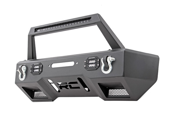 Upgrade your JeepΓÇÖs front bumper with the sleek, modern design of Rough CountryΓÇÖs Stubby LED Bumper. This uniquely designed bumper features a futuristic look that provides unbeatable front-end protection while the stubby design offers plenty of clearance for better approach angles.This bumper features a set of integrated Rough Country 2ΓÇ¥ Flush-Mount LED Pods for powerful off-road lighting any time you need it. Add even more lighting with our optional LED Light Bar Hoop featuring a 20ΓÇ¥ Single-Row Rough Country LED. Choose Black Series or Chrome Series LEDs to match the look of your build.This solid-steel bumper also features a handy winch plate to run any standard sized winch and includes a set of D-rings for easy recovery. The lower portion of the bumper features a laser-cut ΓÇ£RCΓÇ¥ logo and mesh plates for head-turning good looks.