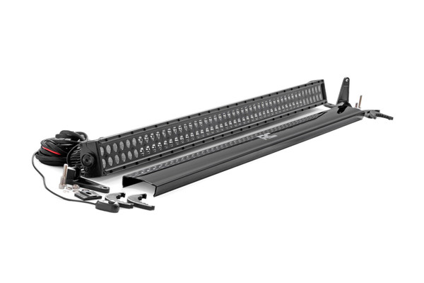 Command the Dark: Light up the night and stay on the trails longer with Rough Country's 50-inch Dual Row CREE LED Light Bar. This powerful light bar offers 23,040 lumens of illumination and 288 watts of energy-efficient output, all housed in a stylish, modern frame. Featuring 96 high-intensity 3-watt CREE LEDs, it delivers superior brightness and durability for any adventure.The sleek black panel design complements vehicles with black accents, such as grilles, wheels, bull bars, or steps. Designed for all-weather performance, this light bar comes with a durable die-cast aluminum housing, ensuring maximum strength and heat dissipation. ItΓÇÖs also backed by an IP67 waterproof rating, providing reliable performance even in harsh conditions.Installation is made simple with the included premium, flat-wound wiring harness, complete with an on/off switch for easy operation. The light bar also features Rough Country's Light Bar Noise Silencers, designed to eliminate unwanted hums, whistles, and wind noise typically found in mounted LED light bars.This light bar includes both end mounts and adjustable base mounts, offering multiple mounting options for maximum versatility. A snap-on cover protects the lens, while Moisture Breather technology reduces moisture build-up inside the light. Plus, itΓÇÖs all backed by a 3-year warranty for peace of mind.