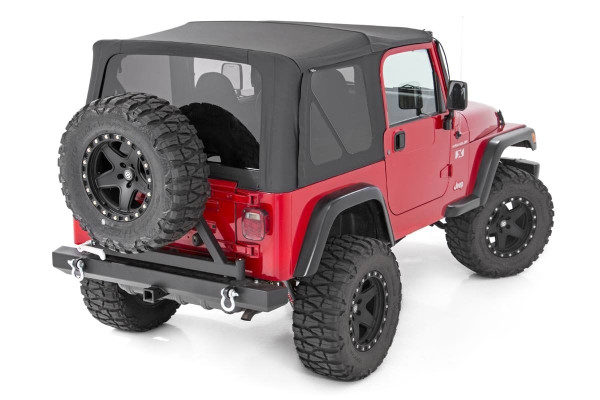 Upgrade Your Style. You love your Jeep Wrangler. And for good reason. It's a vehicle that embodies freedom, adventure, and the off-road lifestyle. But sometimes, you want to create something different, something more exciting. With our weather-resistant soft top replacement, we're making it easier than ever to customize your ride. Now you can upgrade your style while maintaining the rugged durability you depend on. Rough CountryΓÇÿs Soft Top Cover is custom-designed to replace your TJ factory top with ease. It's built to withstand even the harshest elements while providing lasting durability and unique styling.\
Quality Construction. If you want your Jeep to last, you need to protect it! Our top covers feature a premium fabric that withstands the most extreme conditions. You can rely on our premium fit and construction to keep your Jeep looking sharp and ready to go.  Our UV and mildew resistant vinyl coated polyester cotton material make this cover heat and water-resistant, with reinforced stitching with marine-grade bonded polyester thread, double stitched with heat-tape sealed seams for watertight protection. When you're ready for the breeze, our DOT-approved zip-on windows can be removed easily. If you want to experience the utmost in adventure, you need a top that can stand up to even the toughest conditions.\
Installation. What makes our top different? Built to factory original quality specifications, it's designed to provide a tight, wrinkle-free fit on your TJ Wrangler. Easy installation and durable all-weather fabric make this top a smart choice for the active enthusiast. With our state-of-the-art Belt Rail and Hook & Loop attachments, we've taken the guesswork out of installing Jeep tops so you can get a smooth, stable snap-on fit every time.\
Limited Lifetime Replacement Warranty.ΓÇ»Rough Country's products are backed with a limited lifetime replacement warranty towards manufacturer defects. As such, the product is protected from structural and workmanship damage after the date of purchase. With our industry-leading warranty give yourself peace of mind when using Rough Country's products!
