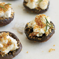 Baked mushrooms filled with walnuts and goat cheese