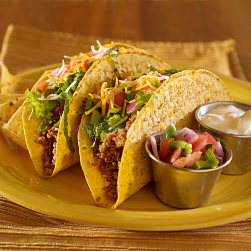 Duo of tacos, filled with shredded beef, chicken or veggies plus lettuce, cheese, guacamole & sour cream.