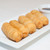 Fried Tequeños (Cheese Pastry Fingers) served with tomato relish sauce.