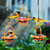 Mosaic Birds Hummble Bold Bird Feeder with Trio of Orange Feeders and Birds