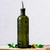 Olive Branch 16oz Recycled Glass Oil or Vinegar Bottle w/ Pour Spout Vintage Green with Olives on Wooden Cutting Board
