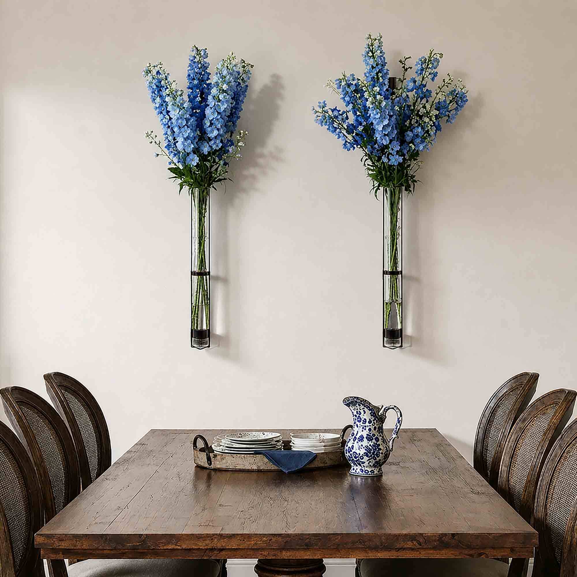 33 in Florence Hanging Pendant Tube Vase Above Dinner Table with Blue Delphiniums