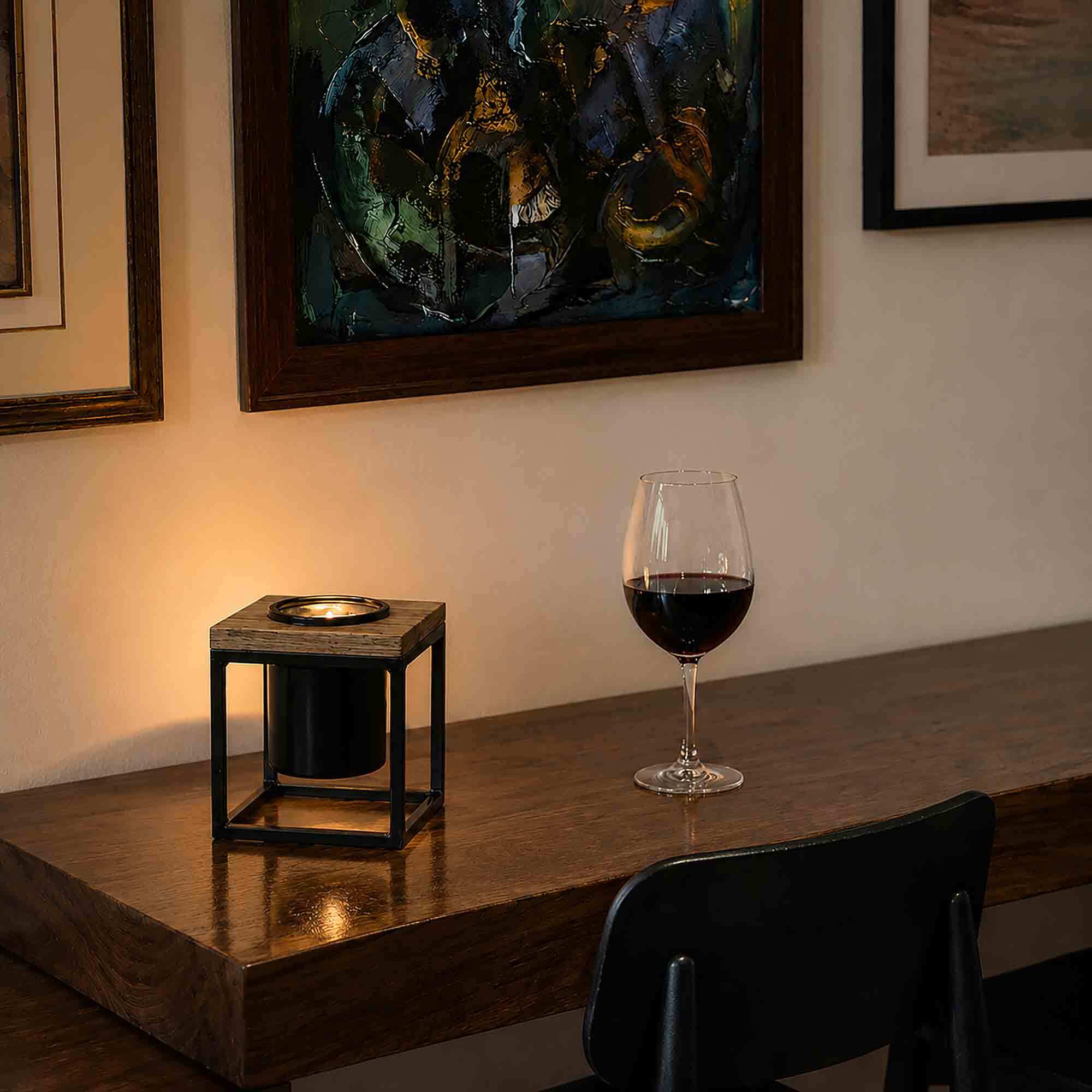 Classic Pablo Cube with Tealight Candle on Bar Top with Glass of Wine in Artsy Restaurant