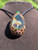 single glow - Boro glass UV mushroom geode pendant.