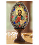 Small wood egg on stand featuring Christ Blessing icon and gold ornamentation.