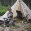 Woman in front of SJK Outpost 4 Tipi Tarp