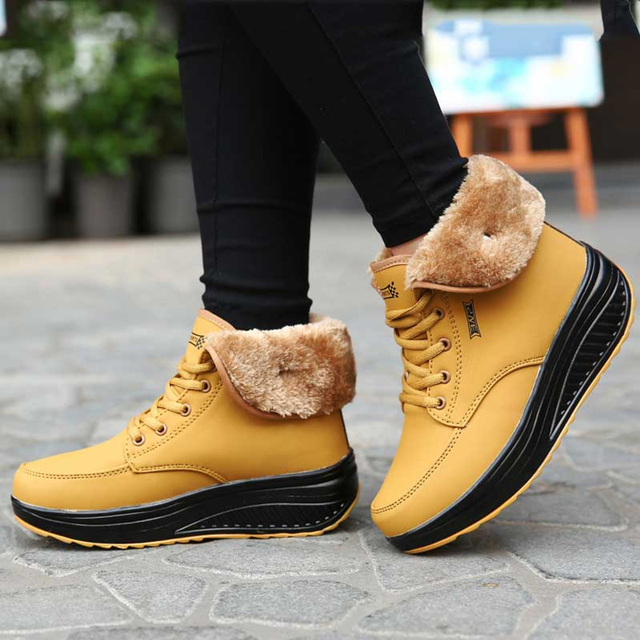 Yellow logo pattern winter rocker bottom shoe sneaker boot