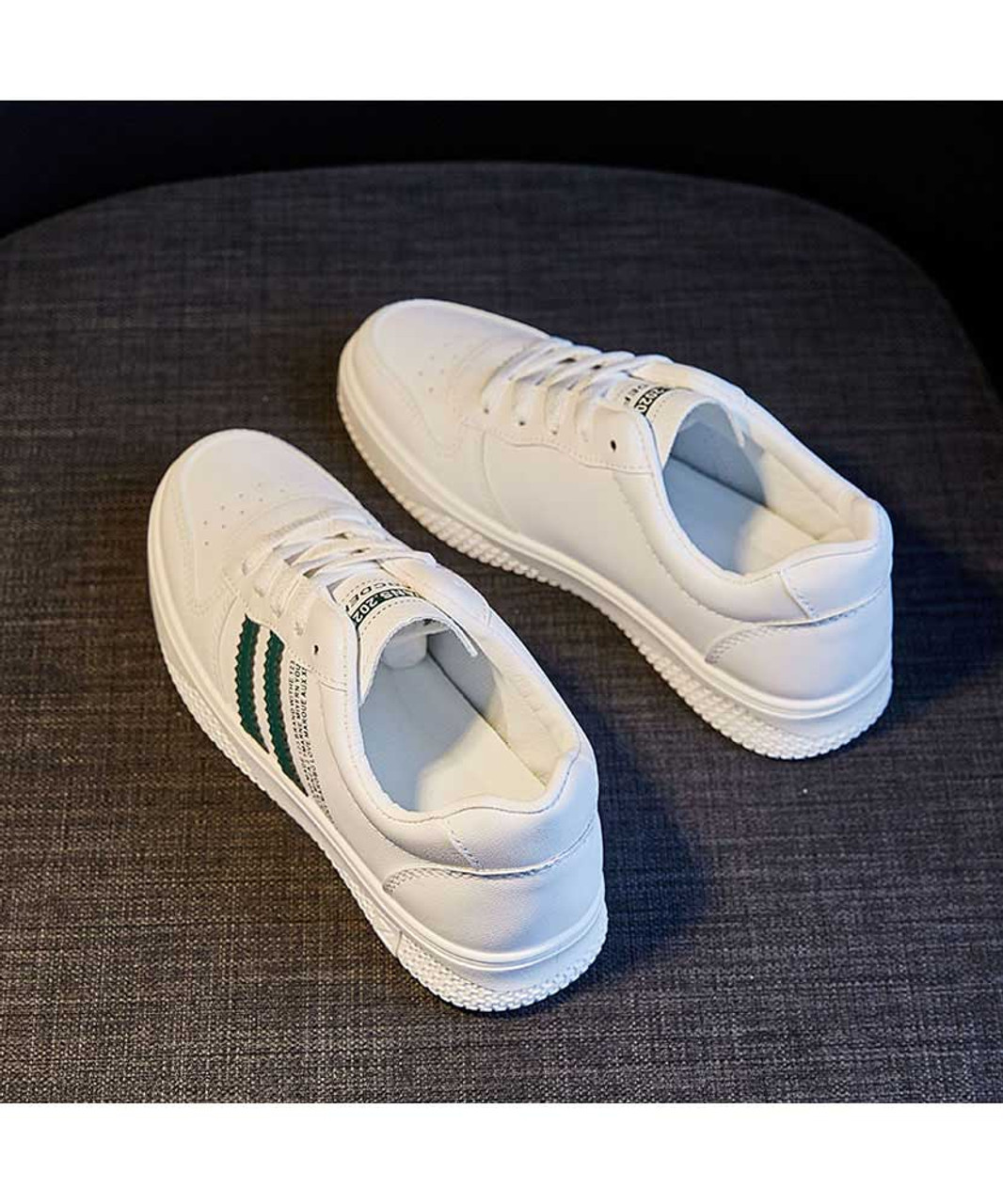 adidas Originals Superstar sneakers in white with collegiate green stripes  | ASOS