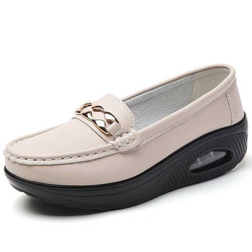 Women's beige metal buckle slip on rocker bottom shoe 01