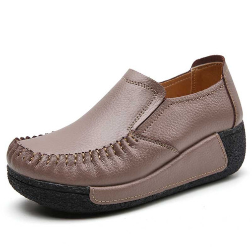 Women's brown sewn accents casual slip on rocker bottom shoe 01