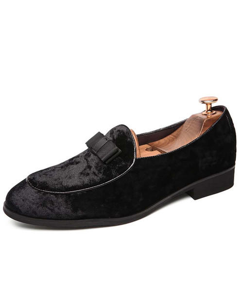 Black leather slip on dress shoes with bow tie design 01