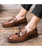 Men's brown tassel on penny strap slip on dress shoe 05