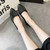 Women's black buckle on top slip on low heel dress shoe 03