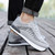 Women's grey stripe pattern texture negative heel rocker sneaker 05