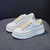 Women's white khaki canvas sewn accents platform shoe sneaker 05