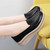 Women's black hollow out slip on rocker bottom sneaker 07