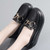 Women's black top metal buckle slip on rocker bottom shoe 02