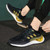 Men's black yellow triple stripe logo pattern sport shoe sneaker 02