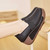 Women's black stretch strap plain slip on rocker bottom shoe 03