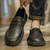 Men's black penny strap slip on shoe loafer in plain 02