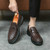 Men's brown weave accents penny strap slip on dress shoe 05