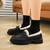 Women's black penny strap winter slip on dress shoe 08