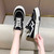 Women's black canvas stripe logo pattern casual shoe sneaker 06