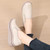 Women's beige stripe accents plain slip on rocker bottom shoe 06