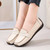 Women's beige penny strap slip on shoe loafer 08