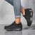 Women's black stripe sock like fit slip on rocker bottom shoe sneaker 05