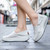 Women's white stripe accents slip on rocker bottom shoe 03
