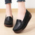 Women's black penny strap slip on rocker bottom shoe 02