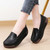 Women's black penny strap slip on rocker bottom shoe 04