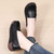Women's black penny strap slip on rocker bottom shoe 07