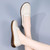 Women's beige stitch accents twist strap slip on shoe loafer 06
