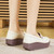 Women's beige penny strap slip on rocker bottom shoe sneaker 07